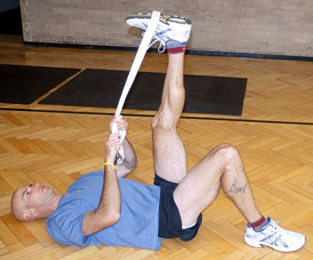 Dan Kehlenbach demonstrating hamstring stretch for bicycle riders